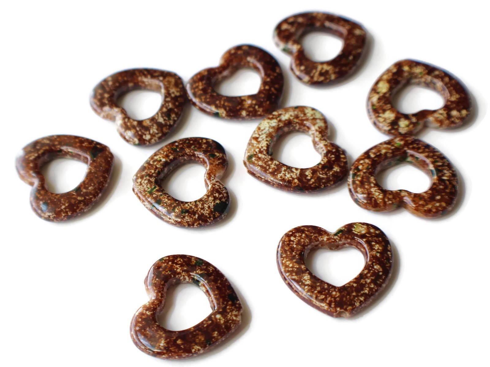 25mm x 29mm Brown Heart Bead Frames Open Heart Plastic Beads Spotted Valentines Beads by Smileyboy | Michaels