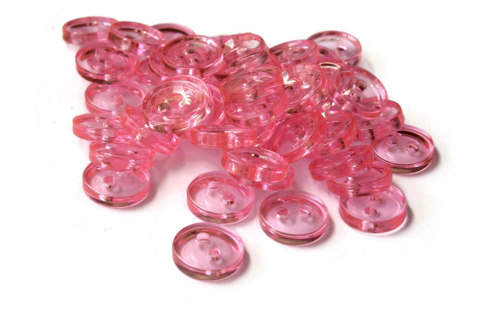 50 11mm Clear Light Pink Flat Round Plastic Two Hole Buttons by Smileyboy | Michaels