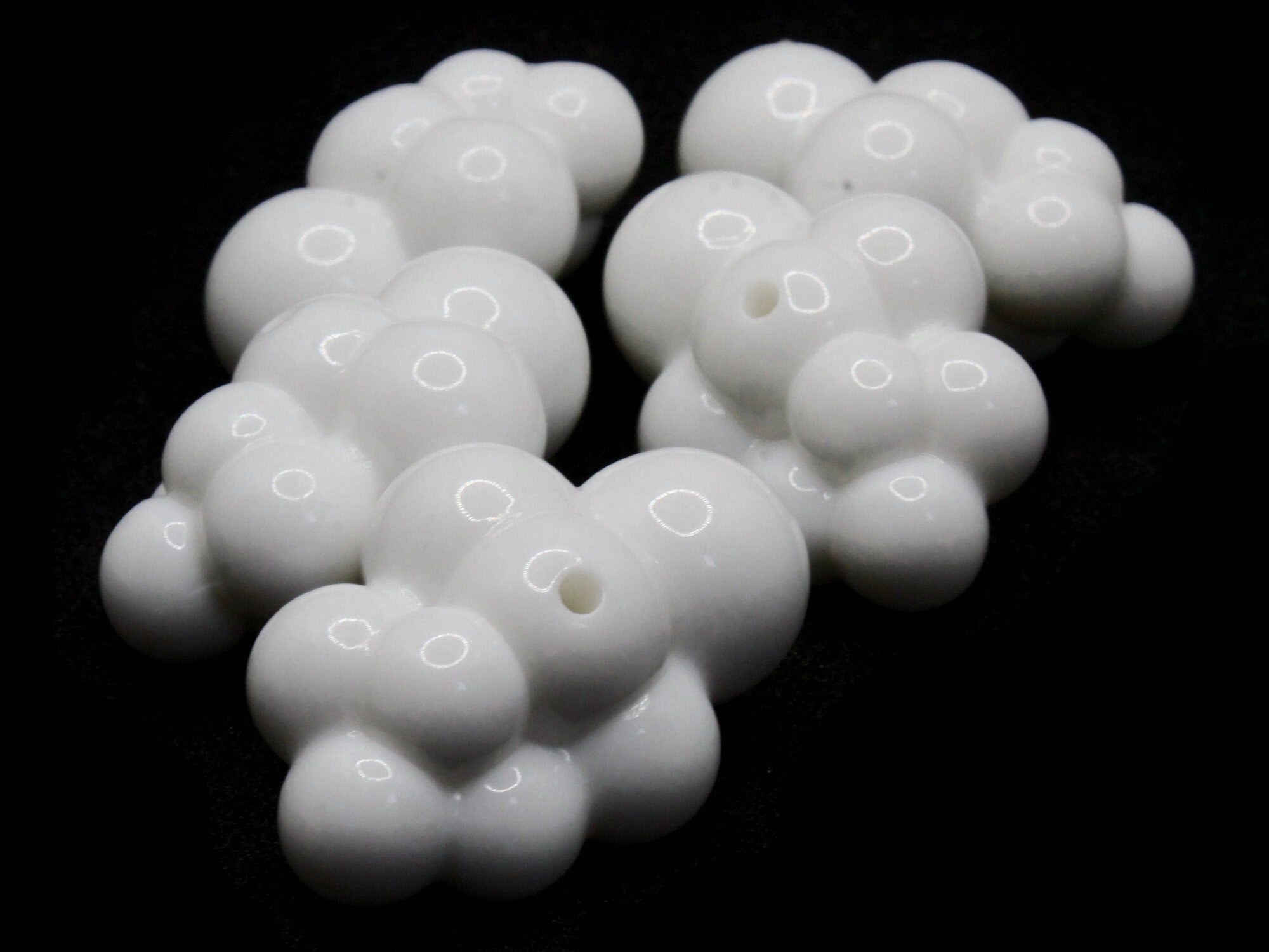 S&S® Worldwide White Plastic Vowel Beads, 6mm