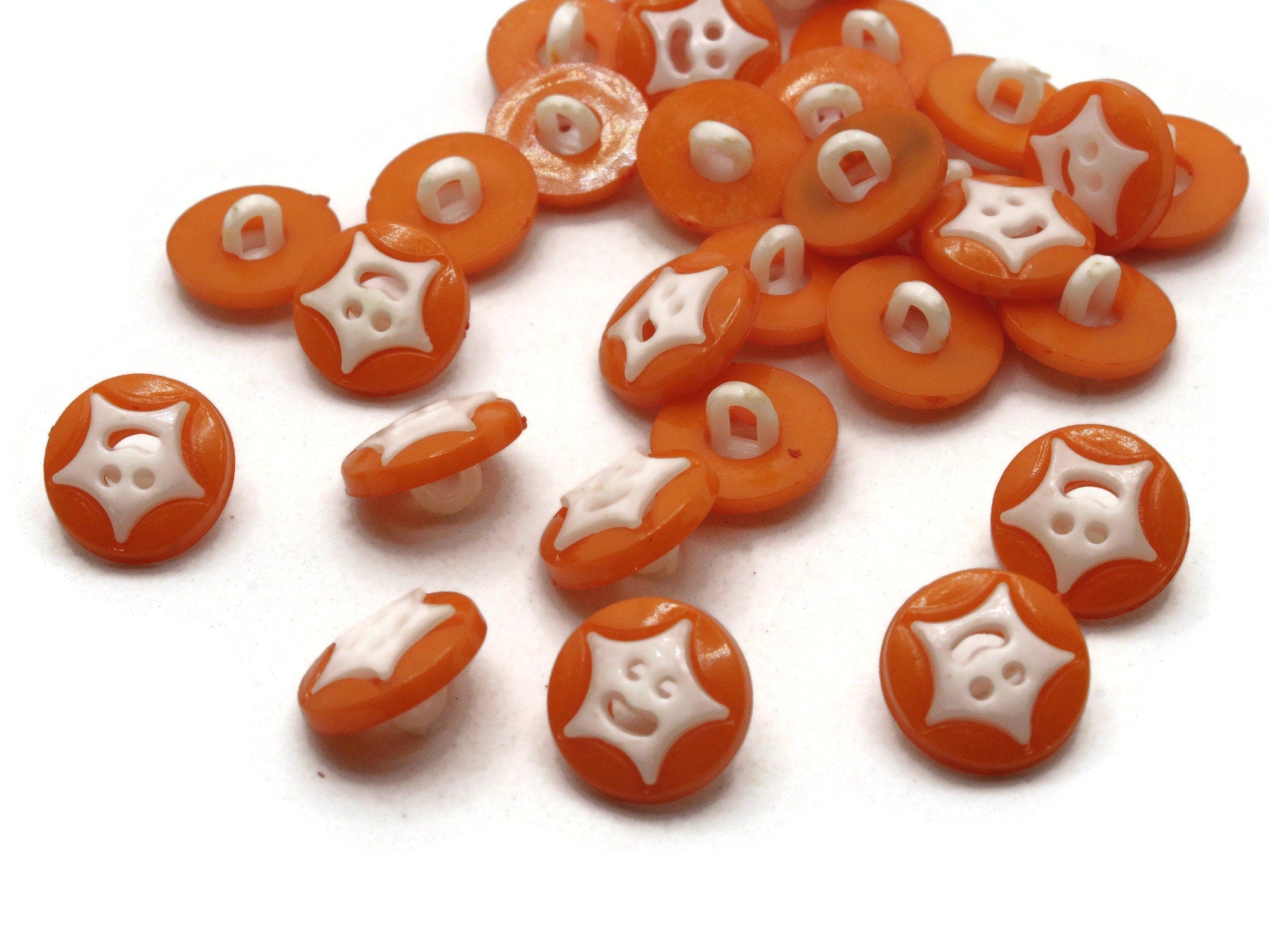 30 14mm Orange and White Smiling Star Plastic Shank Buttons